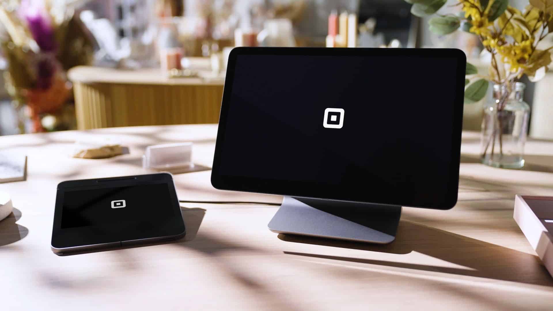 point-of-sale Register displays sitting on a wooden counter